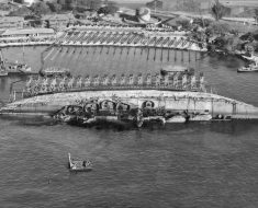 USS Oklahoma in 90 degrees position during the 'parbuckling' process.